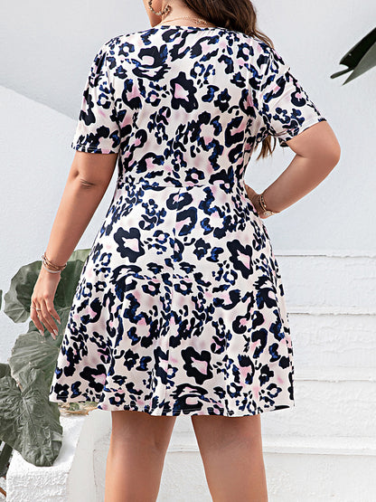 Plus Size Leopard Surplice Mini Dress-VMA Specialties Boutique
